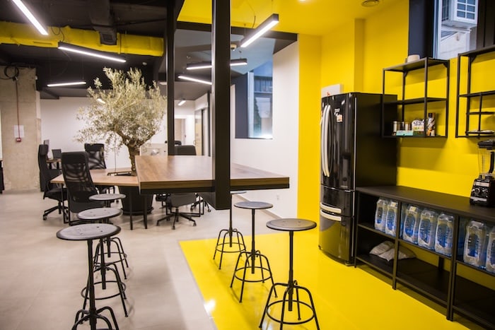 Modern kitchen and lounge area at Košnica coworking
